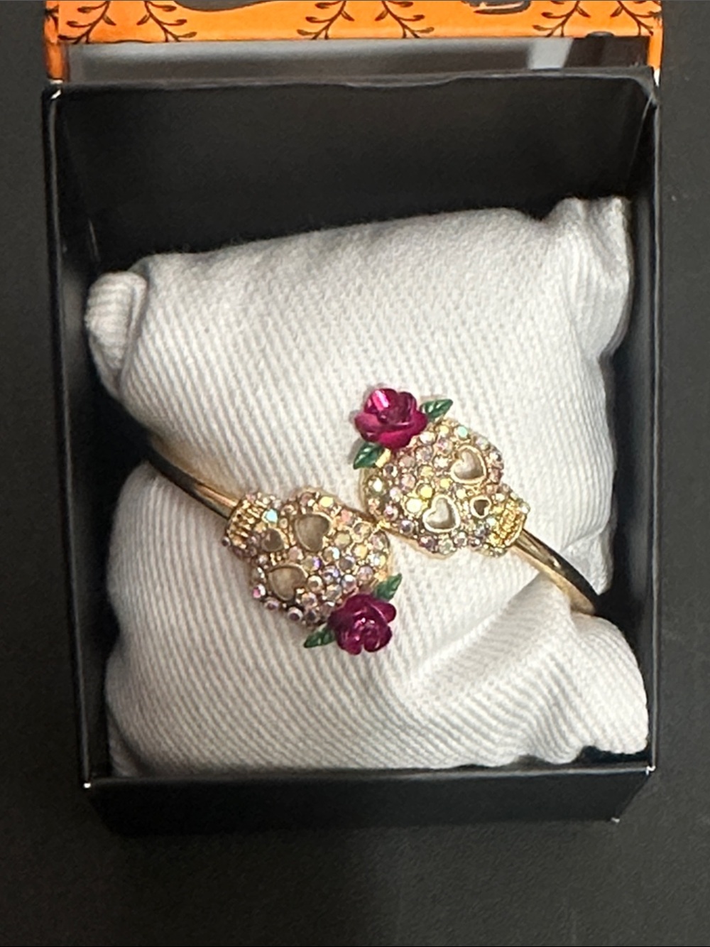 True to form Halloween gold skull with rose bangle bracelet